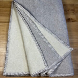 Koc wełniany dwustronny beżowy/ ecru z lamówką w paski 140 x 200 cm (1.9kg)
